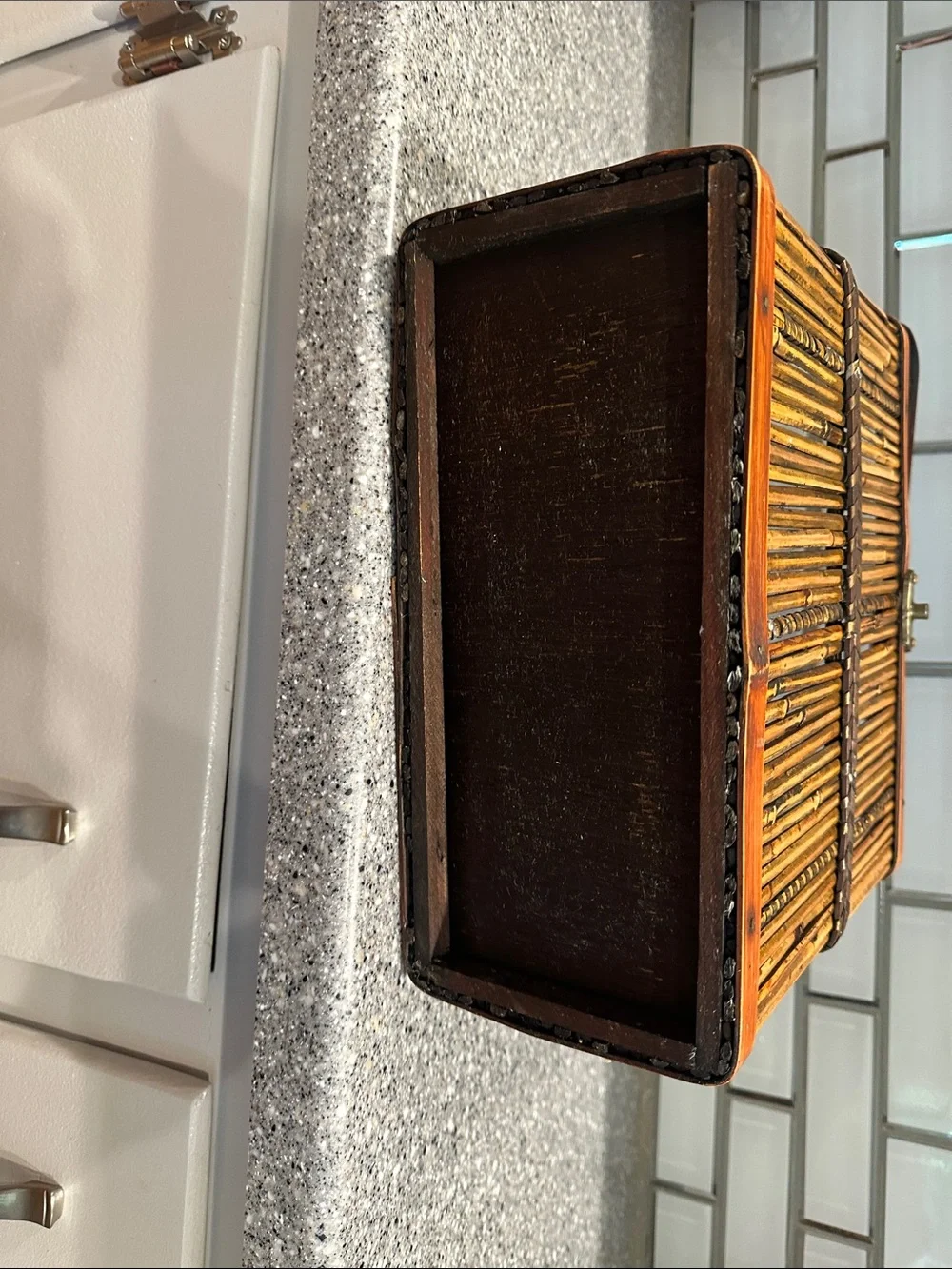 Woven bamboo storage box. All bamboo with metal latch closure.